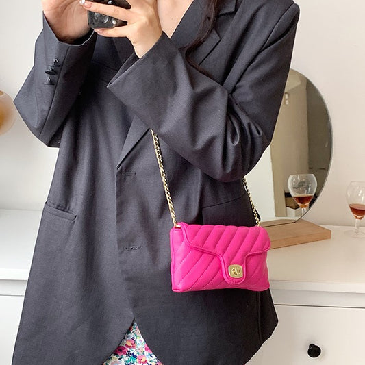 Bolso de mano, crossbody y shoulderbag color rosado y blanco