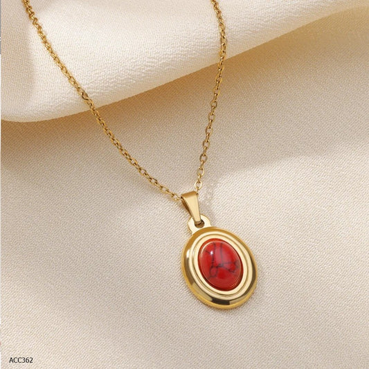 Gargantilla dorada con piedra roja