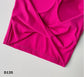 Top deportivo con aumento color fucsia y negro