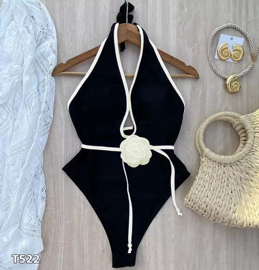 Traje de baño una pieza blanco con negro con flor
