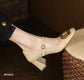 Zapato de tacón alto cuadrado color beige
