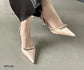 Zapato de tacón medio color rosa claro o beige