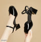 Zapatos de tacón medio en charol color negro y blanco