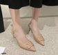 Zapato de tacón bajo negro o beige